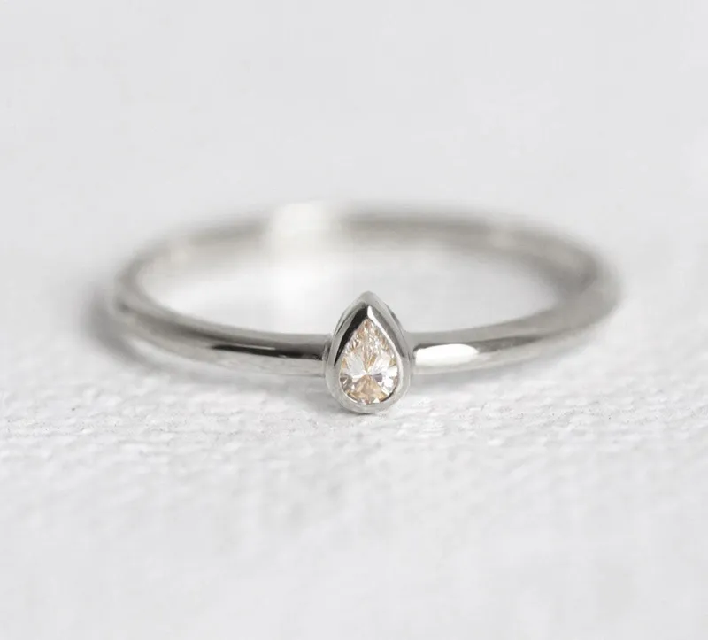 Delicate & Classy: Petite 0.1Ct Pear Solitaire Diamond Ring view 5