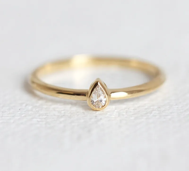 Delicate & Classy: Petite 0.1Ct Pear Solitaire Diamond Ring diamond pear cut engagement ring