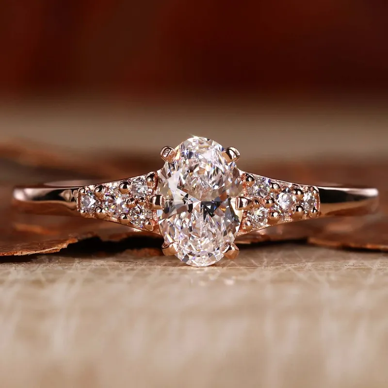 0.55 CT Oval Cut Lab Grown Diamond Muse Engagement Ring round cut engagement ring