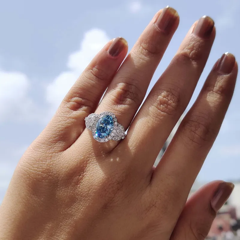 Blue Diamond Oval Engagement Ring blue oval cut engagement ring