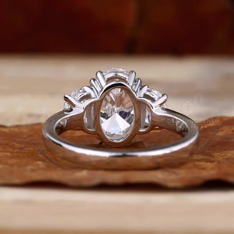 IGI Certified 2.01 CT Oval and Half Moon Lab Grown Diamond Three Stone Engagement Ring view 6
