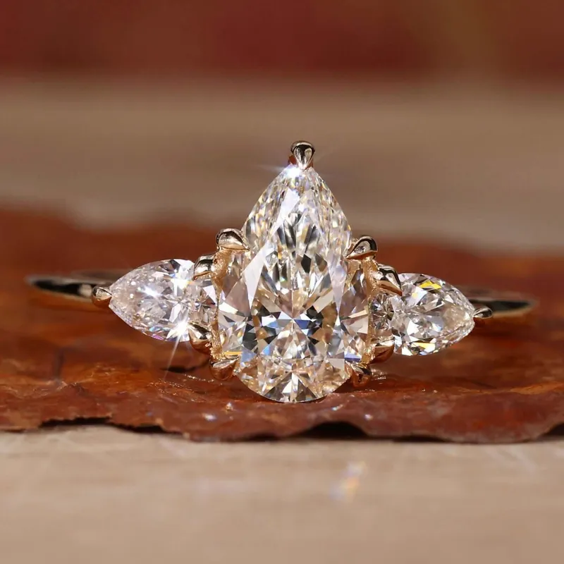 Pear Cut Three Stone Lab Grown Diamond Engagement Ring pear cut engagement ring