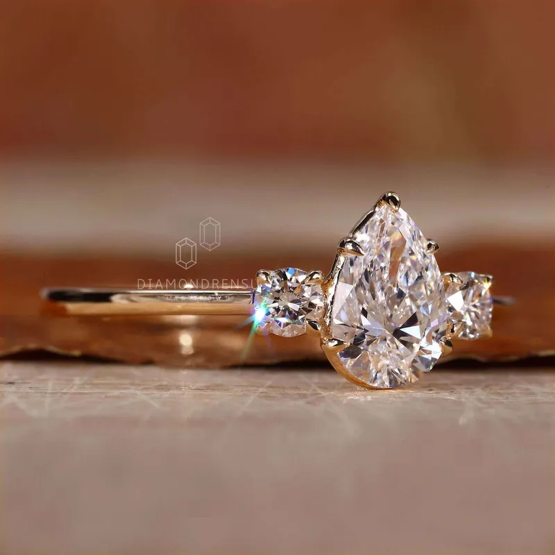 Pear and Round Three Stone Lab Grown Diamond Engagement Ring vy 6