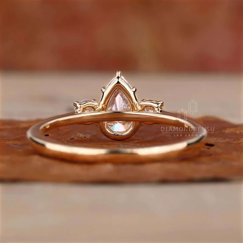 Pear and Round Three Stone Lab Grown Diamond Engagement Ring vy 5