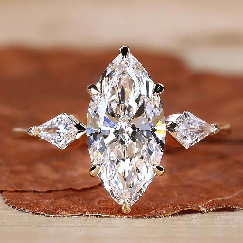 Three Stone Marquise Engagement Ring with Side Kite Cut Diamonds engagement ring