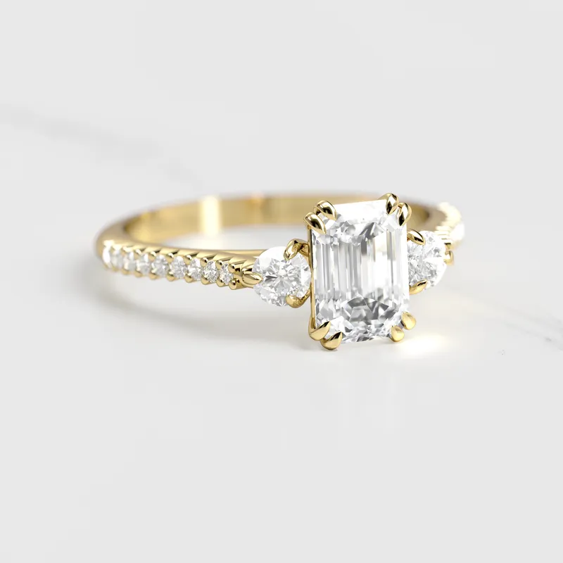 EMERALD HALF PAVE DIAMOND RING WITH ACCENT STONES emerald emerald cut engagement ring