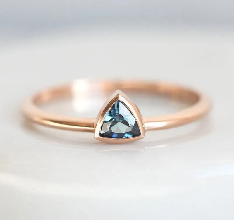 Ekanshi Trillion Cut Sapphire Ring blue sapphire engagement ring