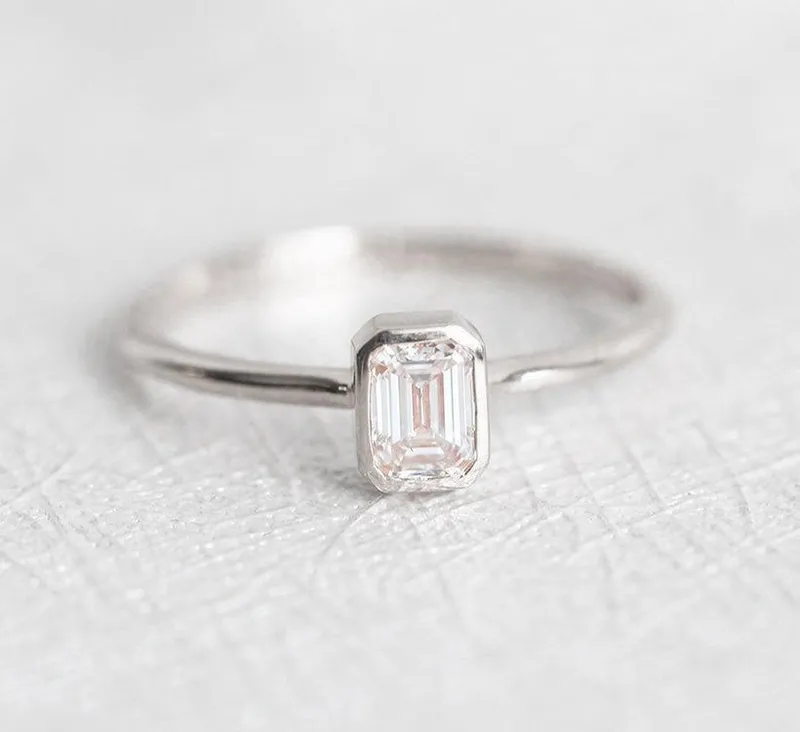 Elegant Solitaire Emerald-Cut Diamond Engagement Ring view 10
