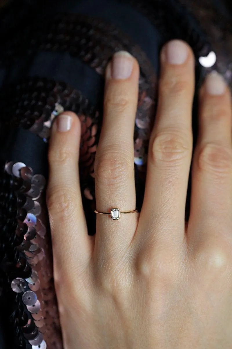 Elegant Solitaire Emerald-Cut Diamond Engagement Ring diamond emerald cut engagement ring