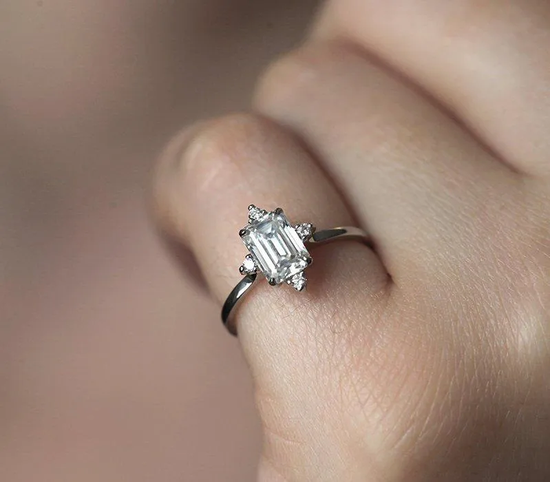 EMERALD CUT MOISSANITE RING IN WHITE GOLD WITH DIAMONDS view 2