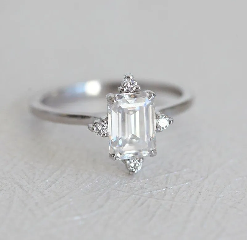 EMERALD CUT MOISSANITE RING IN WHITE GOLD WITH DIAMONDS view 3
