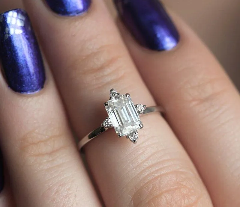 EMERALD CUT MOISSANITE RING IN WHITE GOLD WITH DIAMONDS view 4