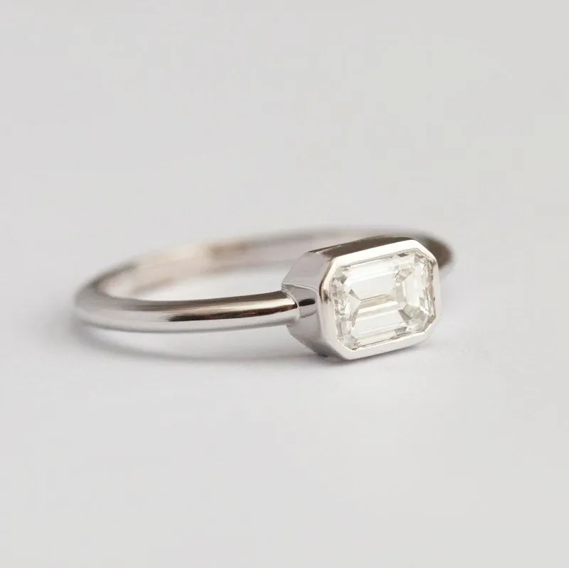 Emerald Cut White Diamond Solitaire Engagement Ring view 3