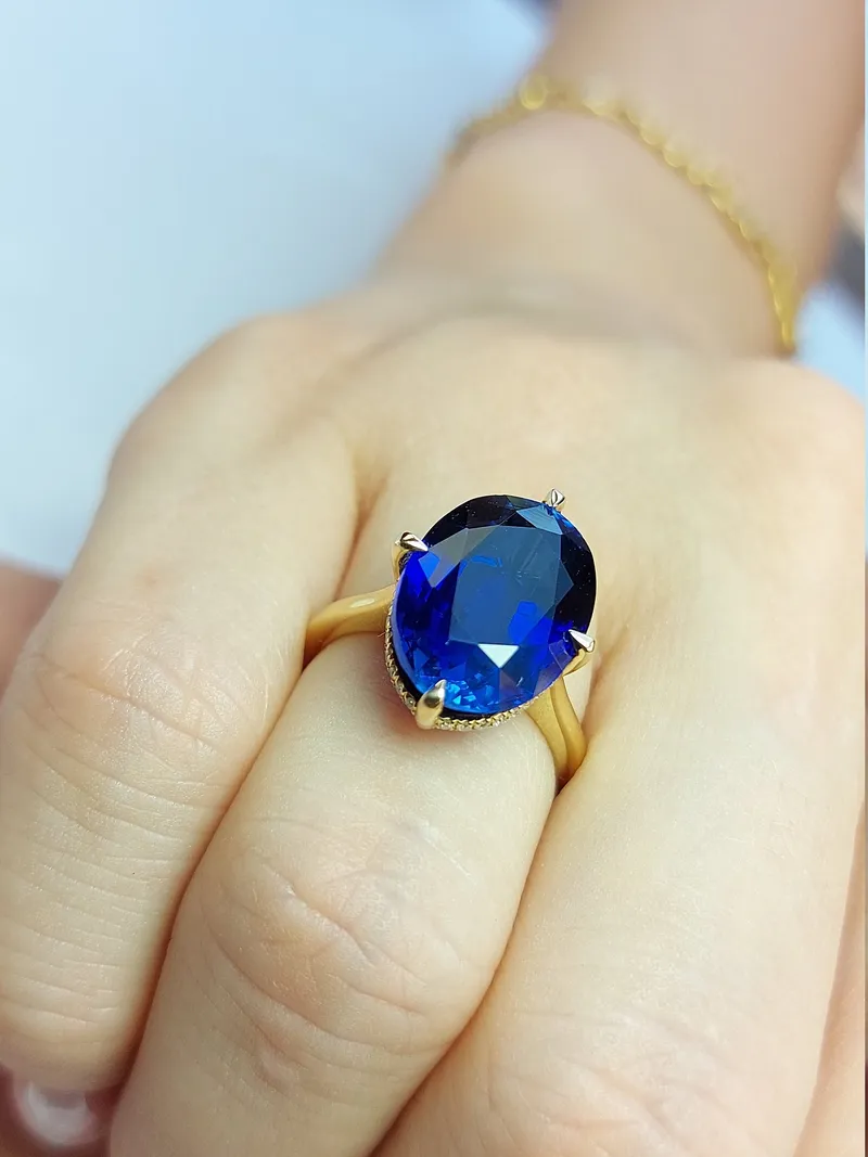 Oval Blue Sapphire Hidden Halo Engagement Ring view 2