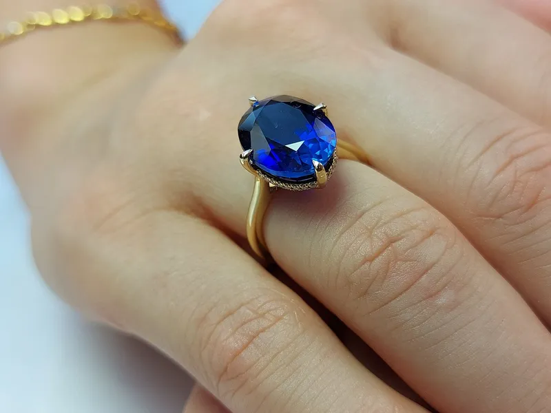 Oval Blue Sapphire Hidden Halo Engagement Ring view 3