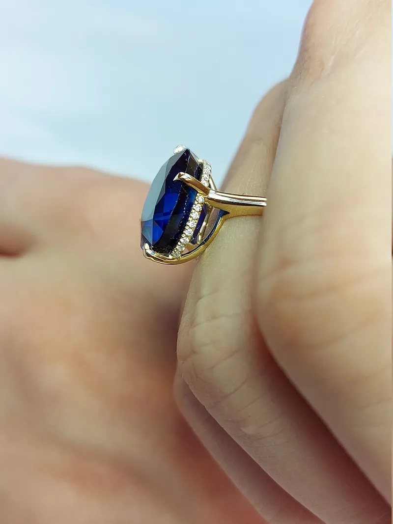 Oval Blue Sapphire Hidden Halo Engagement Ring view 4