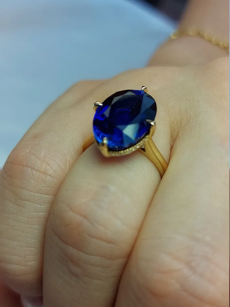 Oval Blue Sapphire Hidden Halo Engagement Ring view 6