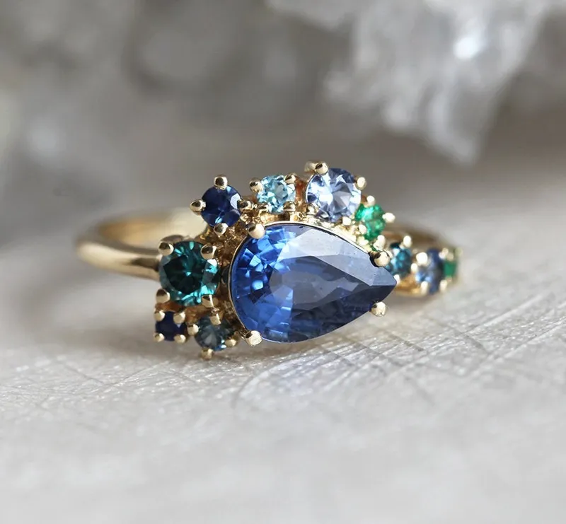 Freyja Blue Sapphire Emerald Topaz Diamond Cluster Ring view 4
