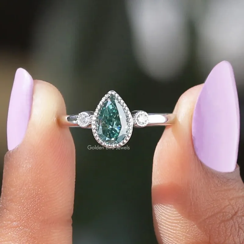 Blue Pear And Round Cut Three Stone Moissanite Ring blue pear cut engagement ring