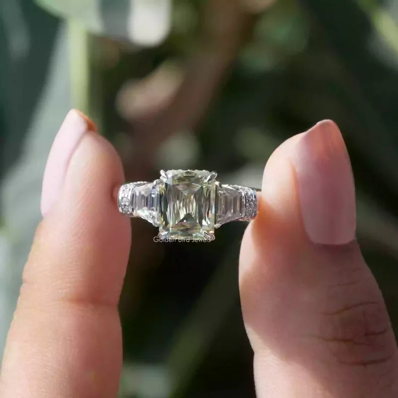 Criss And Trapezoid Cut Three Stone Engagement Ring yellow engagement ring