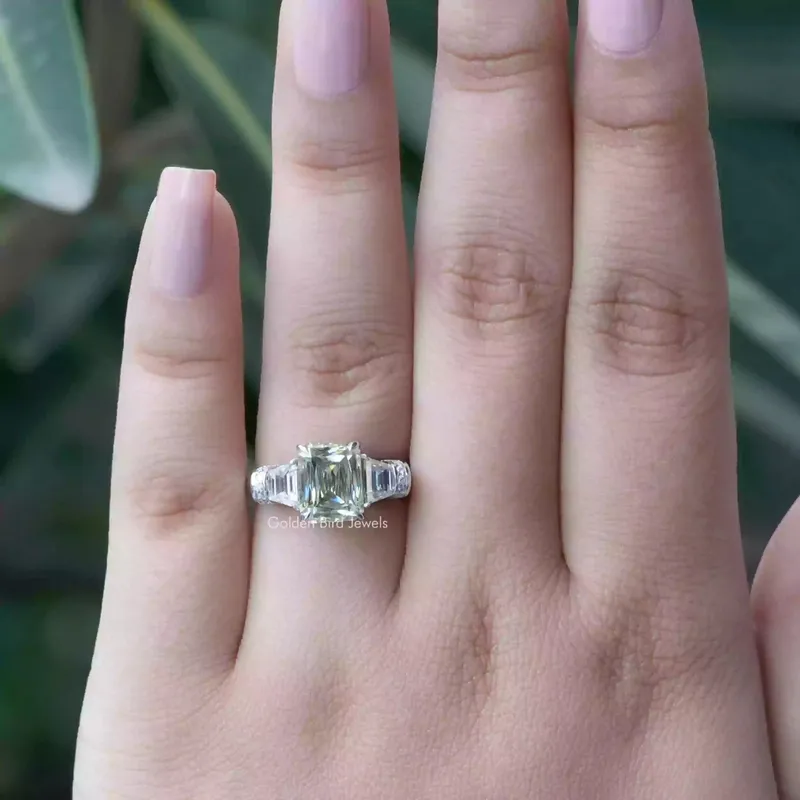 Criss And Trapezoid Cut Three Stone Engagement Ring view 6