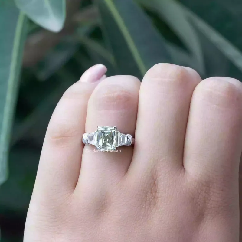Criss And Trapezoid Cut Three Stone Engagement Ring view 4