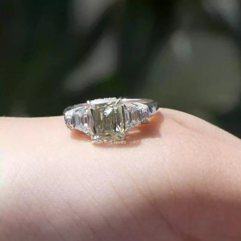 Criss And Trapezoid Cut Three Stone Engagement Ring view 3