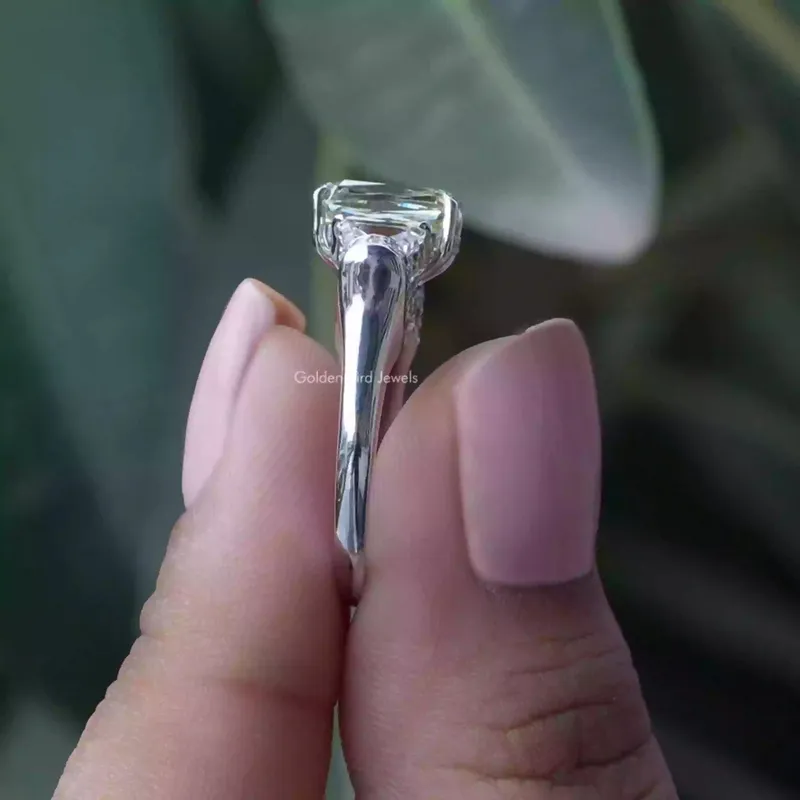 Criss And Trapezoid Cut Three Stone Engagement Ring view 2