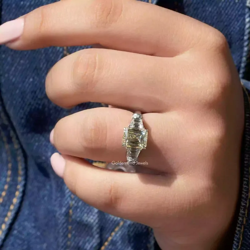 Criss And Trapezoid Cut Three Stone Engagement Ring view 7