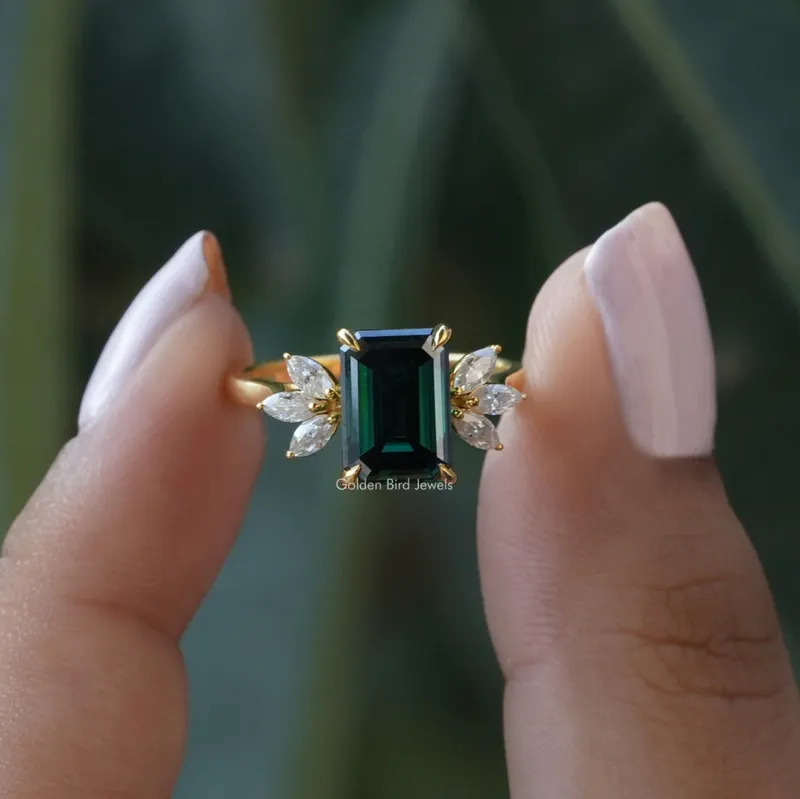 Dark Green Emerald And Marquise Cut Engagement Ring green emerald emerald cut engagement ring