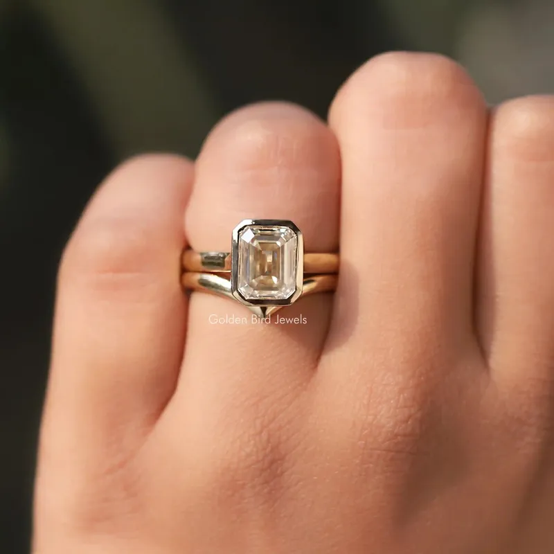 Emerald Cut Moissanite Solitaire Bezel Set Ring With Curved Band view 5