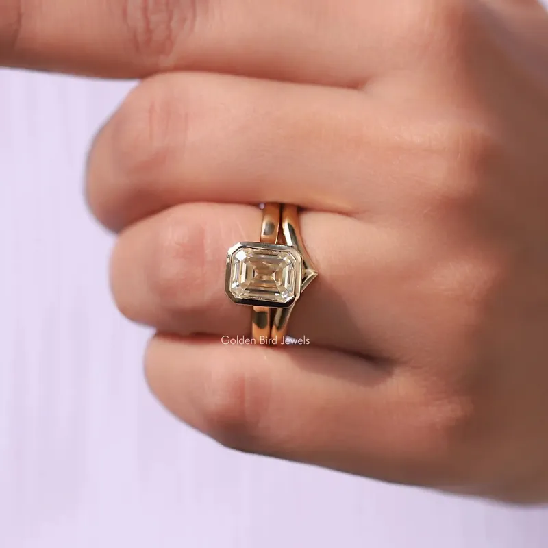 Emerald Cut Moissanite Solitaire Bezel Set Ring With Curved Band view 7