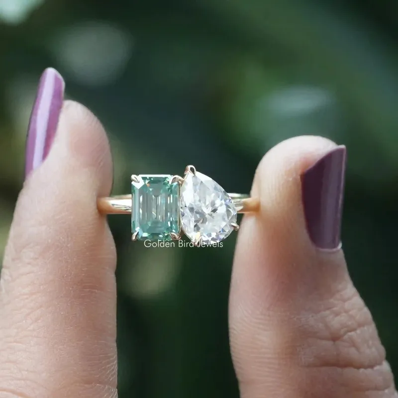 Pear And Emerald Cut Two Stone Moissanite Ring blue emerald emerald cut engagement ring