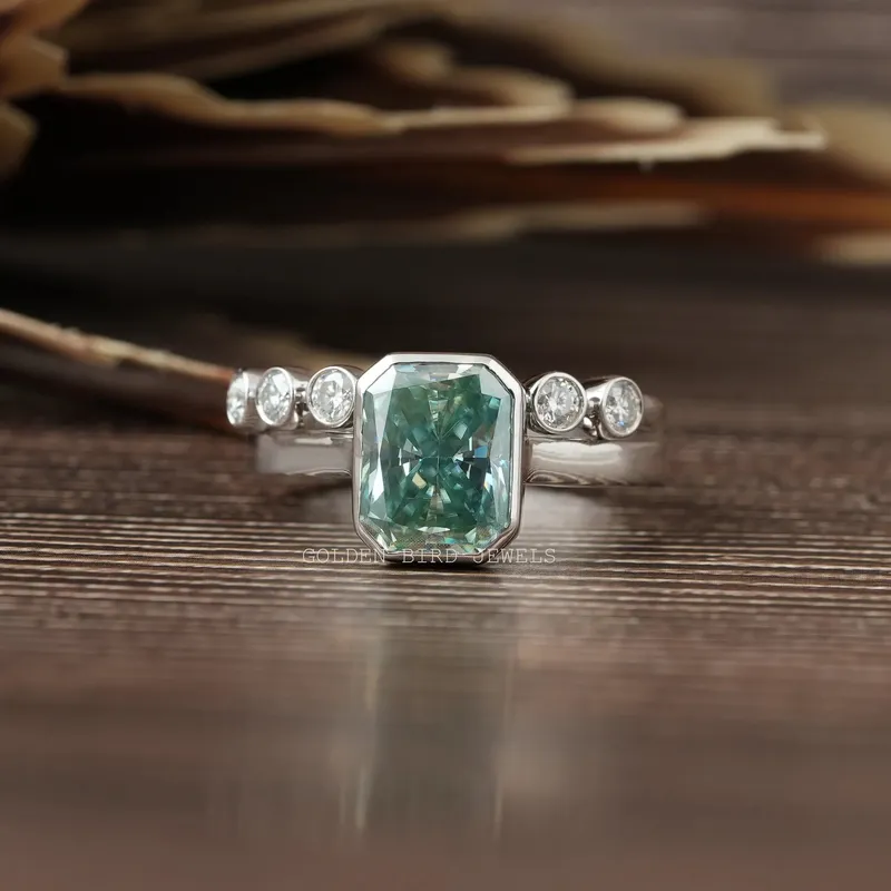 Radiant Cut Bezel Set Engagement Ring With Wedding Band blue round cut engagement ring