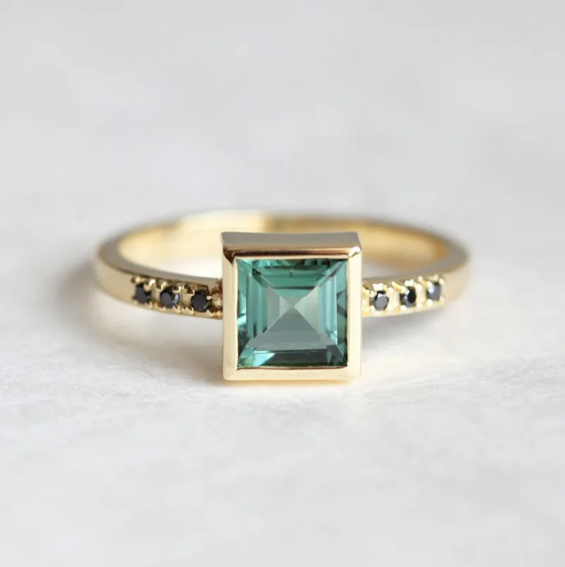 Green Tourmaline Ring With Black Diamonds engagement ring