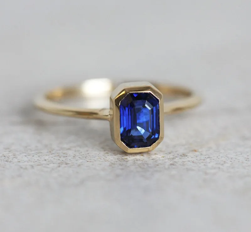 Gul Emerald Cut Sapphire Solitaire Ring blue sapphire emerald cut engagement ring