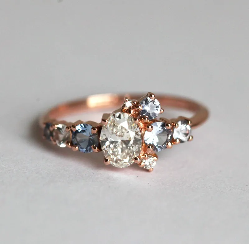 Jago Oval Diamond Sapphire Cluster Ring diamond oval cut engagement ring