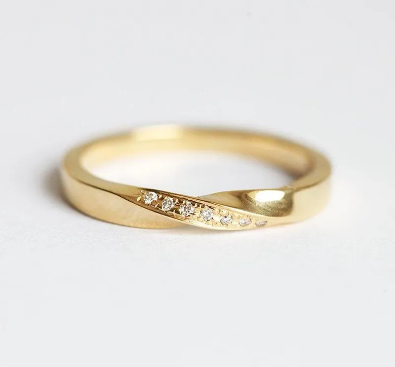 KSENA TWISTED WEDDING RING WITH DIAMONDS round cut engagement ring