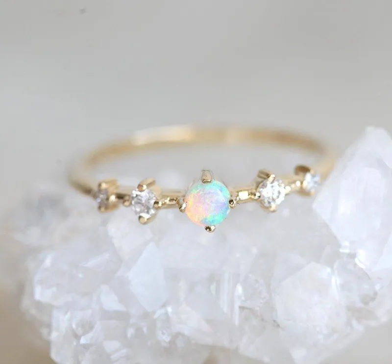 MADDY OPAL AND DIAMOND RING vy 4