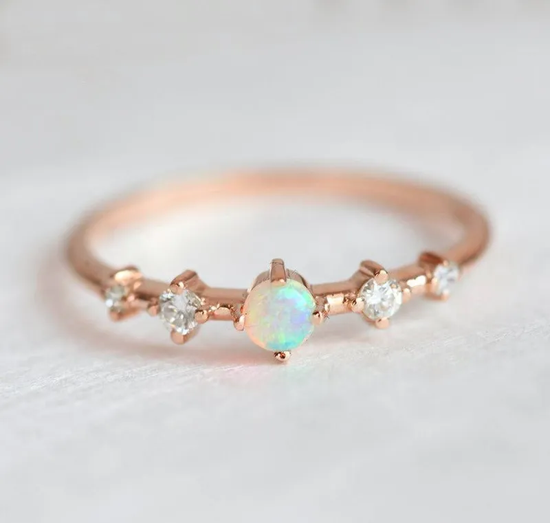 MADDY OPAL AND DIAMOND RING vy 8