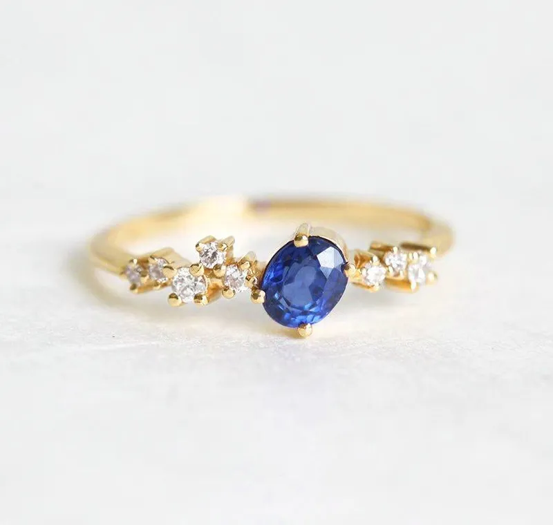 MIRACH OVAL SAPPHIRE DIAMOND CLUSTER RING vy 7
