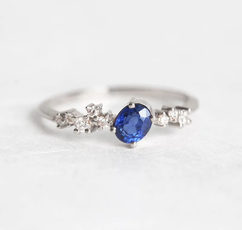 MIRACH OVAL SAPPHIRE DIAMOND CLUSTER RING vy 8
