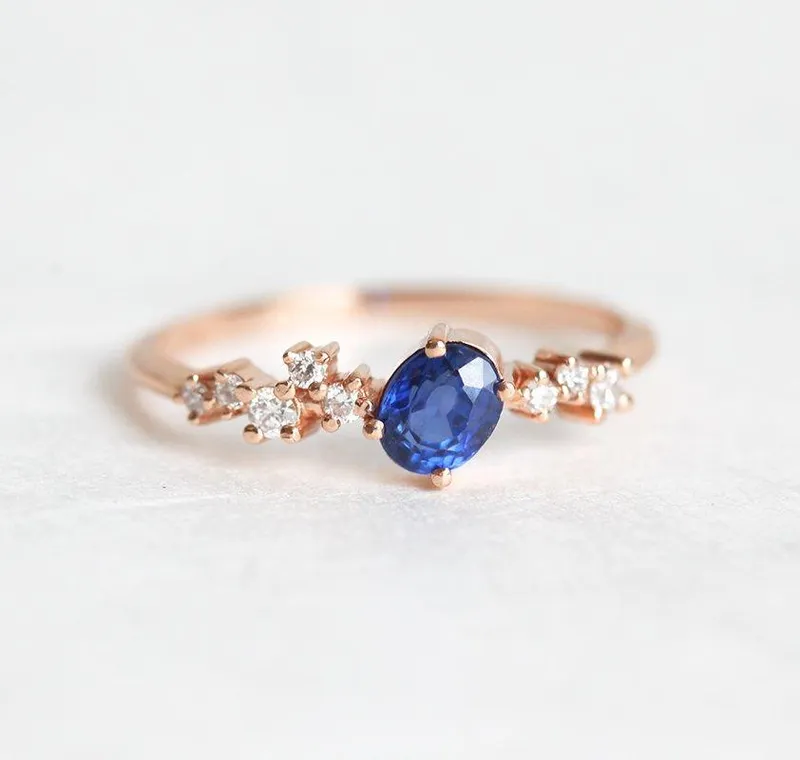 MIRACH OVAL SAPPHIRE DIAMOND CLUSTER RING blue sapphire oval cut engagement ring