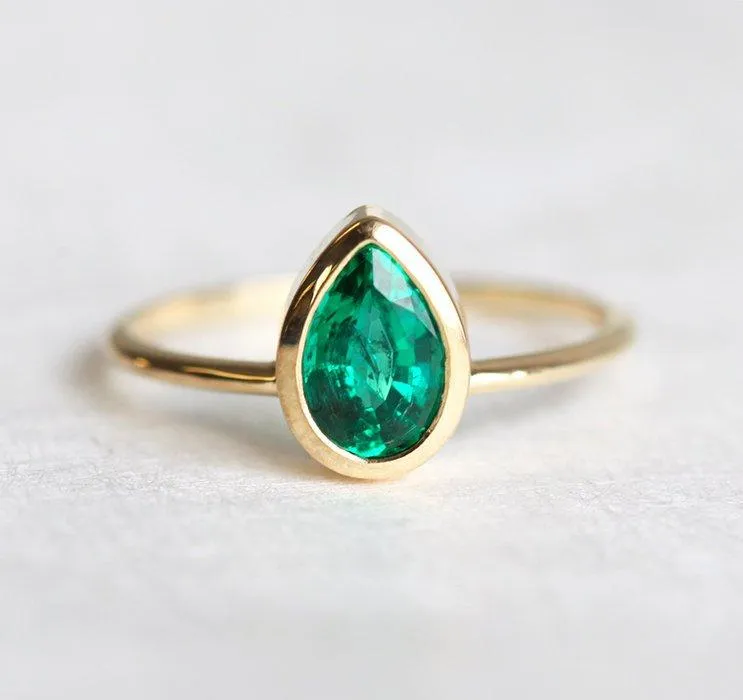 Miriam Pear Emerald Ring green emerald emerald cut engagement ring