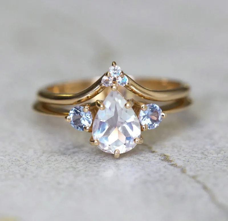 Misella Pear Moissanite Ring With Side Moss Agate view 11