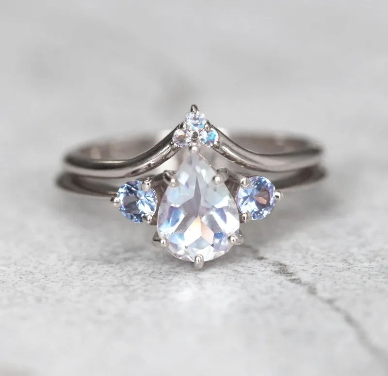 Misella Pear Moissanite Ring With Side Moss Agate view 12