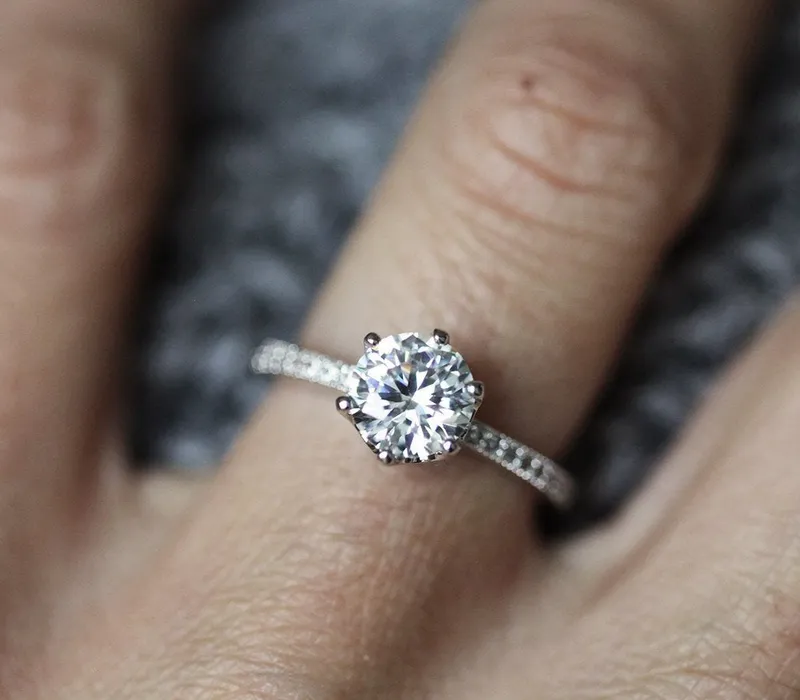 Moissanite Prong Engagement Ring With Side Diamonds round cut engagement ring