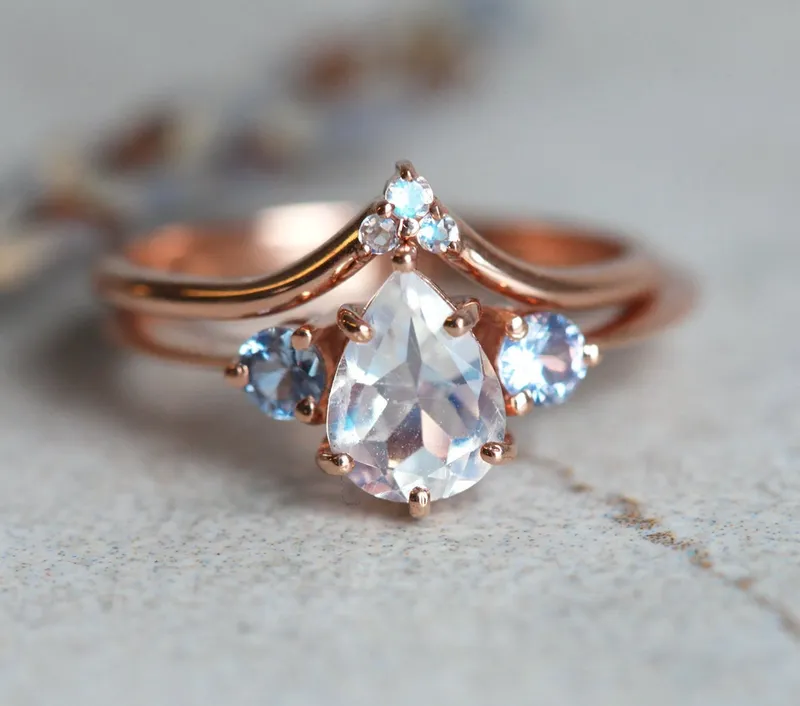 Moonstone And Sapphire Ring Set With Matching Band blue pear cut engagement ring