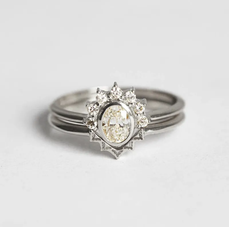 Oval Diamond Ring With Sparkling Halo Diamond Crown view 10