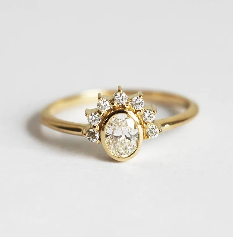 Oval Diamond Ring With Sparkling Halo Diamond Crown diamond oval cut engagement ring